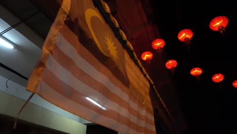 Malaysia-flag-with-background-lantern-at-street